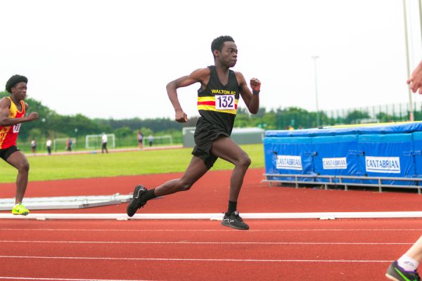 Man running on an athletics track