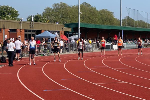 Athletics lined up on a athletics track